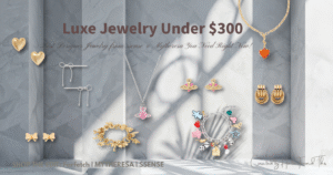 A flat-lay curation of must-have designer jewelry for 2026, featuring silver bow earrings by Marland Bucks, a gold butterfly and heart chain bracelet, a silver Vivienne Westwood Saturn orb necklace with pink crystals, Roxanne Assoulin red heart pendant, Heaven Mayhem interlocking gold earrings, a mixed metal and pearl drop earring, and a complex Marc Jacobs charm bracelet. Background is a light grey marble wall with tropical leaf shadows.